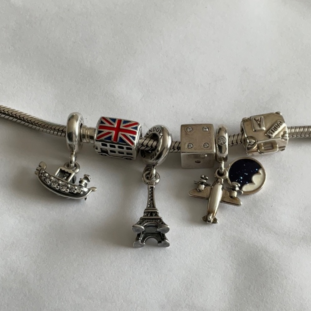 Pandora travel team bracelet and charms